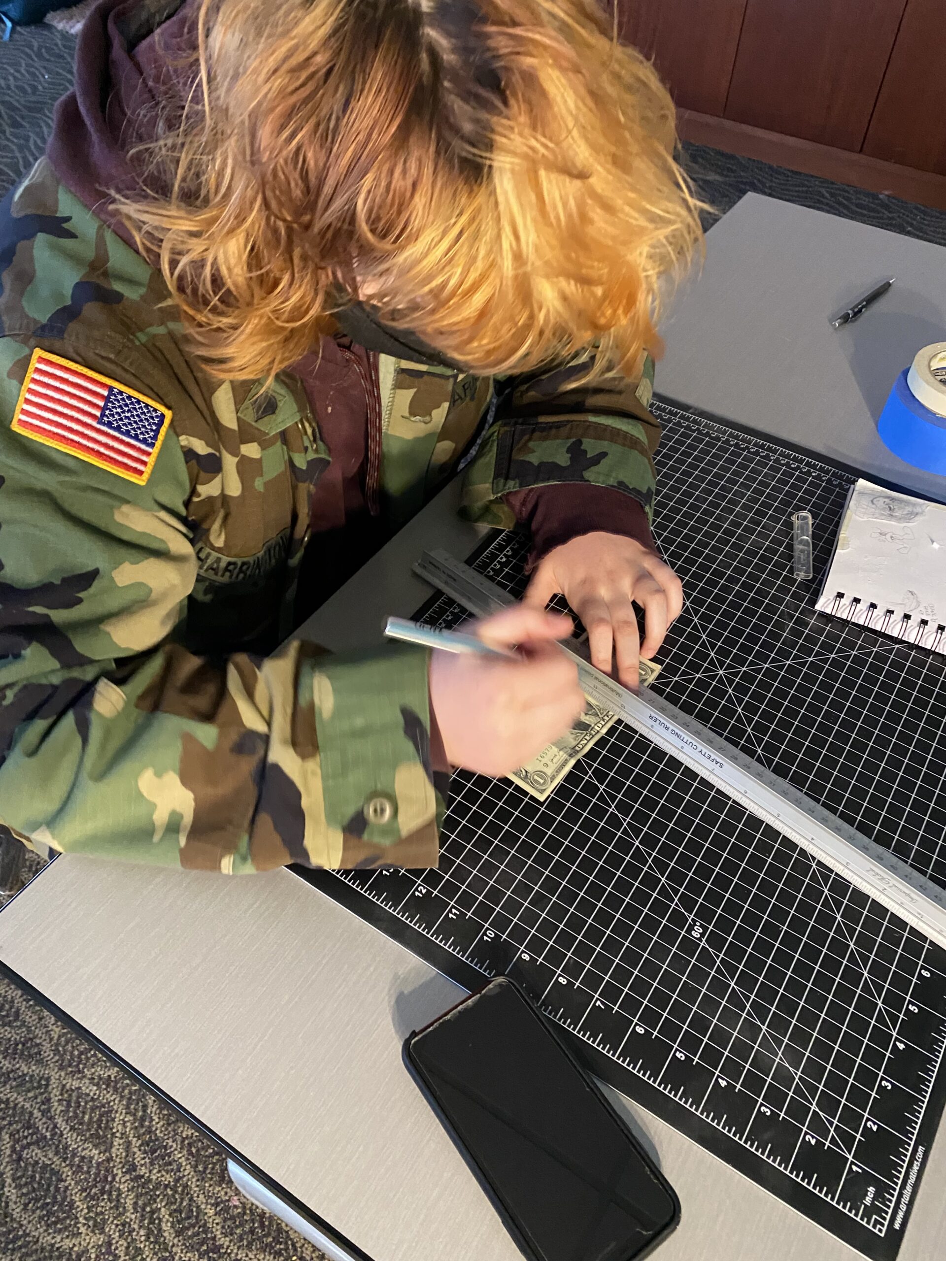 Student working at a table.